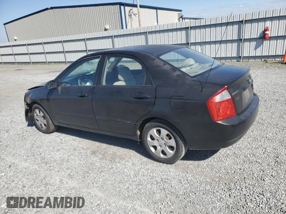 2004 Kia Spectra LX with VIN KNAFE121X45021922, listed as a Copart auction lot 49989845 with 184,189 mi miles and Salvage Title. Bid and sale history available at carsss.com. Image 2.