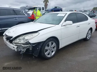2005 Lexus ES 330 with VIN JTHBA30G055084186, listed as a IAAI auction lot 42064508 with 154,736 mi miles. Bid and sale history available at carsss.com. Image 2.