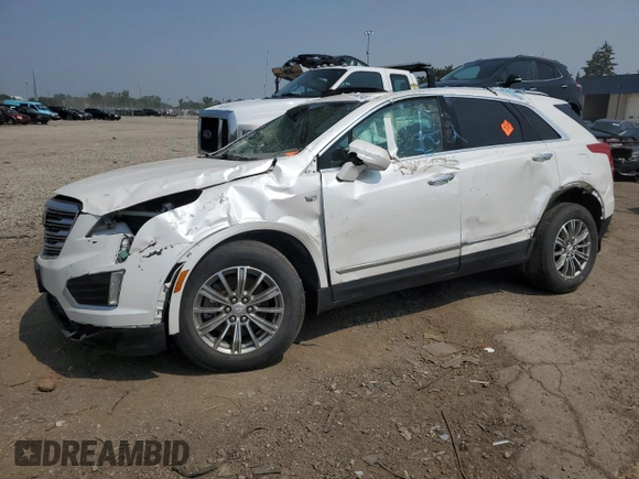 2017 Cadillac XT5 Luxury FWD with VIN 1GYKNBRS2HZ296859, listed as a Copart auction lot 64982445 with 30,765 mi miles and Salvage title. Bid and sale history available at DreamBid. Image 1.