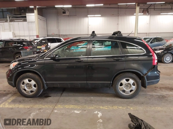 2011 Honda CR-V LX with VIN JHLRE4H31BC034421, listed as a IAAI auction lot 41512179 with 147,508 mi miles and . Bid and sale history available at DreamBid. Image 14.