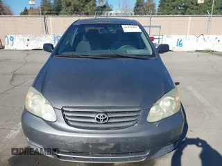 2003 Toyota Corolla CE with VIN 1NXBR32E43Z059733, listed as a IAAI auction lot 41431469 with 299,999 mi miles and . Bid and sale history available at DreamBid. Image 6.