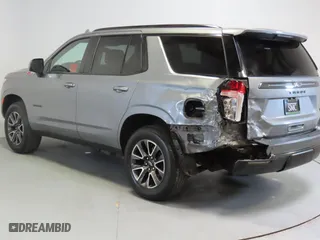 2022 Chevrolet Tahoe Z71 with VIN 1GNSKPKD4NR243963, listed as a Copart auction lot 53908825 with 60,945 mi miles and Salvage Title. Bid and sale history available at carsss.com. Image 4.
