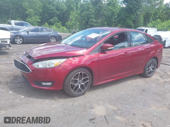 2015 Ford Focus SE z VIN 1FADP3F25FL313033, wystawiony jako IAAI lot #42206507 z przebiegiem 142 938 mil mil oraz . Historia ofert i sprzedaży dostępna na DreamBid. Obrazek 2.