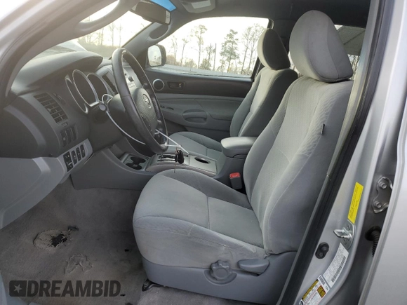 2010 Toyota Tacoma PreRunner with VIN 3TMJU4GN6AM102922, listed as a Copart auction lot 49826455 with 302,827 mi miles and Salvage Title. Bid and sale history available at DreamBid. Image 7.