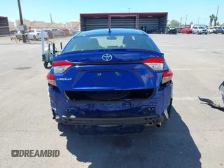 2022 Toyota Corolla SE with VIN JTDS4MCE4NJ099869, listed as a IAAI auction lot 41848244 with 24,357 mi miles and . Bid and sale history available at DreamBid. Image 17.