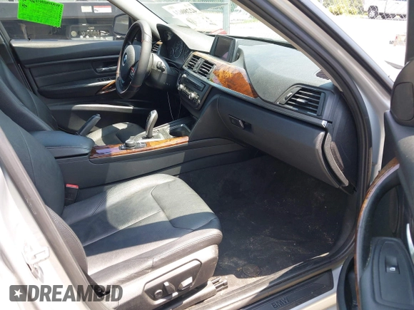 2013 BMW 3 Series 328i xDrive with VIN WBA3B3C52DJ975970, listed as a IAAI auction lot 42280624 with 2,262,225 mi miles and . Bid and sale history available at DreamBid. Image 5.