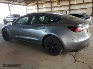 2025 Tesla Model 3 Long Range with VIN 5YJ3E1EB8SF922812, listed as a Copart auction lot 48794645 with 1,731 mi miles and Salvage Title. Bid and sale history available at carsss.com. Image 2.