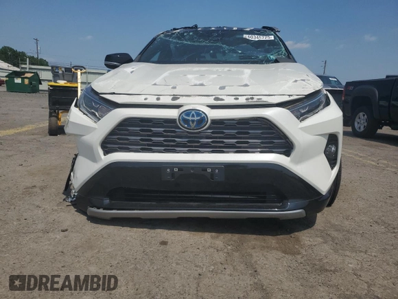 2021 Toyota RAV4 Hybrid XSE with VIN 4T3E6RFV0MU038650, listed as a Copart auction lot 60345725 with 24,124 mi miles and Salvage title. Bid and sale history available at DreamBid. Image 5.