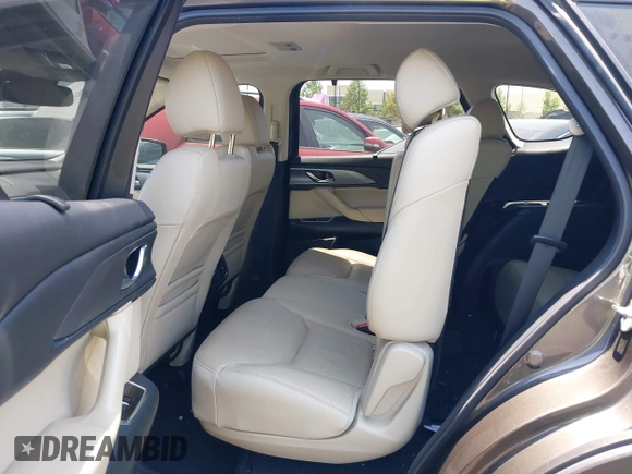2017 Mazda CX-9 Touring with VIN JM3TCBCY1H0131233, listed as a IAAI auction lot 42490137 with 84,216 mi miles and . Bid and sale history available at DreamBid. Image 8.