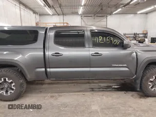 2016 Toyota Tacoma SR5 with VIN 3TMDZ5BN0GM012248, listed as a IAAI auction lot 41215908 with 170,756 mi miles and . Bid and sale history available at DreamBid. Image 14.