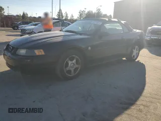 2004 Ford Mustang Deluxe with VIN 1FAFP44664F208419, listed as a Copart auction lot 46318695 with 151,942 mi miles and Salvage Title. Bid and sale history available at carsss.com. Image 1.
