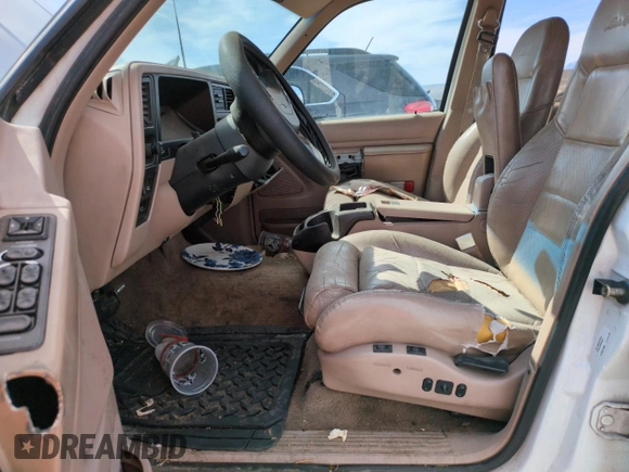 1992 Ford Explorer Eddie Bauer with VIN 1FMDU34X2NUE11927, listed as a Copart auction lot 52094875 with 53,449 mi miles and Salvage title. Bid and sale history available at DreamBid. Image 7.