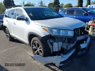 2019 Toyota Highlander LE with VIN 5TDZZRFH1KS290313, listed as a IAAI auction lot 41669428 with 119,149 mi miles and . Bid and sale history available at DreamBid. Image 1.