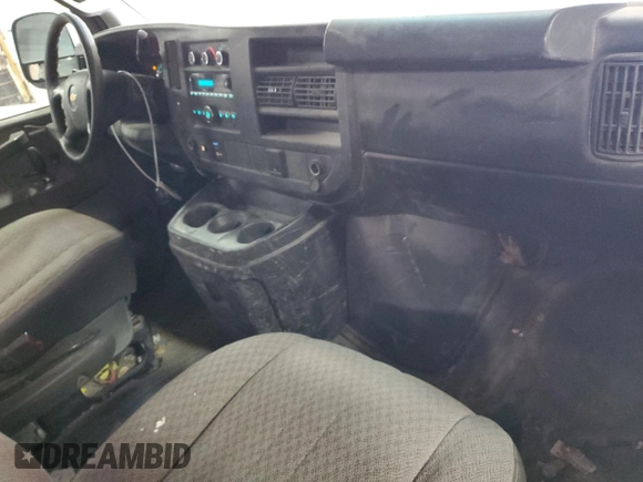 2016 Chevrolet Express Cargo with VIN 1GCWGAFF3G1290682, listed as a Copart auction lot 58050485 with 276,257 mi miles and Salvage title. Bid and sale history available at DreamBid. Image 8.