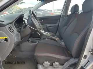 2007 Kia Rio LX with VIN KNADE123776231384, listed as a Copart auction lot 73554084 with 0 mi miles and Salvage Title. Bid and sale history available at carsss.com. Image 7.