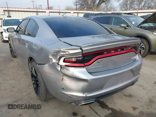 2015 Dodge Charger SXT with VIN 2C3CDXHG4FH884058, listed as a IAAI auction lot 41724894 with 202,701 mi miles and . Bid and sale history available at DreamBid. Image 3.