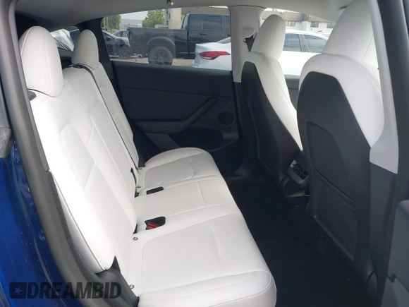 2023 Tesla Model Y Long Range z VIN 7SAYGDEE5PA102285, wystawiony jako IAAI lot #42402981 z przebiegiem 24 550 mil mil oraz . Historia ofert i sprzedaży dostępna na DreamBid. Obrazek 8.