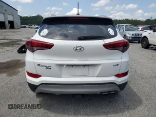 2017 Hyundai Tucson Sport z VIN KM8J33A20HU501435, wystawiony jako Copart lot #58805485 z przebiegiem 54 289 mil mil oraz Tytuł czysty. Historia ofert i sprzedaży dostępna na DreamBid. Obrazek 6.