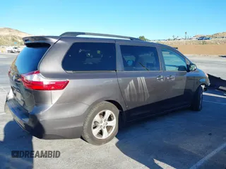 2015 Toyota Sienna LE AAS with VIN 5TDKK3DC3FS529845, listed as a IAAI auction lot 41627102 with 130,334 mi miles. Bid and sale history available at carsss.com. Image 14.