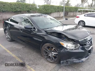 2015 Mazda 6 i Grand Touring with VIN JM1GJ1W55F1194337, listed as a IAAI auction lot 41594010 with 159,529 mi miles. Bid and sale history available at carsss.com. Image 1.