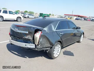 2016 Cadillac CTS Sedan RWD with VIN 1G6AP5SX8G0106667, listed as a IAAI auction lot 39978567 with 96,773 mi miles. Bid and sale history available at carsss.com. Image 4.