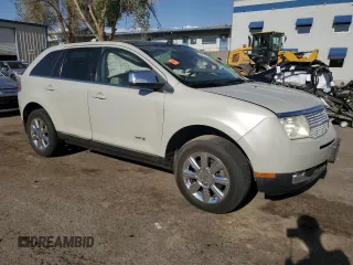 2007 Lincoln MKX z VIN 2LMDU88C07BJ26919, wystawiony jako Copart lot #55778005 z przebiegiem Nie podano mil oraz Szkoda całkowita • Salvage title. Historia ofert i sprzedaży dostępna na DreamBid. Obrazek 4.