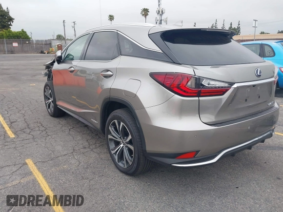 2021 Lexus RX 450h with VIN 2T2HGMDA3MC060208, listed as a IAAI auction lot 42163455 with 34,167 mi miles and . Bid and sale history available at DreamBid. Image 3.