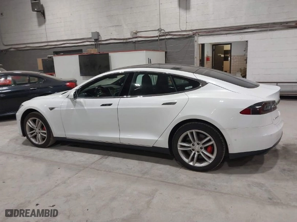2016 Tesla Model S 90D with VIN 5YJSA1E44GF131208, listed as a IAAI auction lot 42060513 with 84,125 mi miles. Bid and sale history available at carsss.com. Image 14.