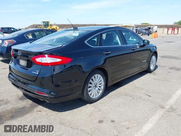 2016 Ford Fusion SE Hybrid with VIN 3FA6P0LU9GR405102, listed as a IAAI auction lot 42358807 with 91,130 mi miles and . Bid and sale history available at DreamBid. Image 4.