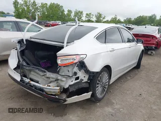 2016 Ford Fusion Titanium with VIN 3FA6P0K96GR103571, listed as a IAAI auction lot 42340764 with 180,870 mi miles and . Bid and sale history available at DreamBid. Image 4.