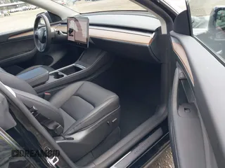 2024 Tesla Model Y with VIN 7SAYGDED3RF119101, listed as a IAAI auction lot 42019817 with 35,714 mi miles and . Bid and sale history available at DreamBid. Image 5.