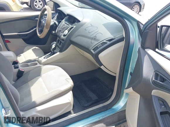 2012 Ford Focus SE with VIN 1FAHP3F2XCL240934, listed as a IAAI auction lot 42673102 with 188,658 mi miles and . Bid and sale history available at DreamBid. Image 5.