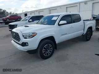 2023 Toyota Tacoma 4WD SR with VIN 3TMCZ5AN9PM566739, listed as a IAAI auction lot 41513763 with 16,708 mi miles. Bid and sale history available at carsss.com. Image 18.