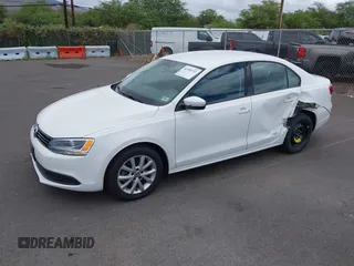 2012 Volkswagen Jetta SE z VIN 3VWDP7AJ7CM350057, wystawiony jako IAAI lot #42499732 z przebiegiem 92 203 mil mil oraz . Historia ofert i sprzedaży dostępna na DreamBid. Obrazek 2.