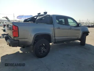 2018 Chevrolet Colorado 4WD ZR2 z VIN 1GCGTEEN6J1196917, wystawiony jako Copart lot #52257535 z przebiegiem 52 299 mil mil oraz Szkoda całkowita • Salvage title. Historia ofert i sprzedaży dostępna na DreamBid. Obrazek 3.