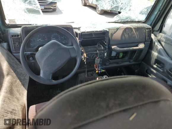 1999 Jeep Wrangler SE with VIN 1J4FY29P0XP422425, listed as a Copart auction lot 60513335 with Not provided miles and Clean title. Bid and sale history available at DreamBid. Image 8.