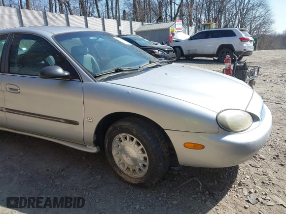 1999 Mercury Sable LS z VIN 1MEFM53S7XA622932, wystawiony jako IAAI lot #41708531 z przebiegiem 155 702 mil mil oraz . Historia ofert i sprzedaży dostępna na DreamBid. Obrazek 16.