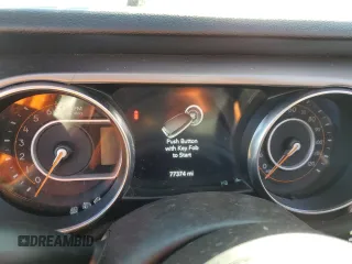 2019 Jeep Wrangler Unlimited Sport Altitude with VIN 1C4HJXDG9KW556159, listed as a Copart auction lot 49736915 with 77,374 mi miles and Salvage title. Bid and sale history available at DreamBid. Image 9.
