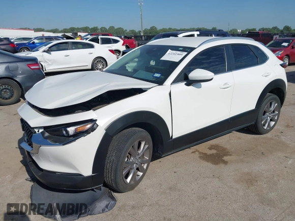 2023 Mazda CX-30 S Carbon Edition with VIN 3MVDMBCM2PM552282, listed as a IAAI auction lot 42241909 with 14,765 mi miles and . Bid and sale history available at DreamBid. Image 2.