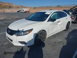 2018 Nissan Altima S with VIN 1N4AL3AP5JC294610, listed as a IAAI auction lot 41436696 with 124,835 mi miles and . Bid and sale history available at DreamBid. Image 2.