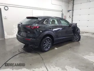 2024 Mazda CX-30 2.5 S with VIN 3MVDMBAM0RM721141, listed as a IAAI auction lot 40984709 with 870 mi miles. Bid and sale history available at carsss.com. Image 4.