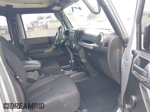 2018 Jeep Wrangler Unlimited Sport S with VIN 1C4BJWDG4JL861052, listed as a IAAI auction lot 42100517 with 43,907 mi miles and . Bid and sale history available at DreamBid. Image 5.
