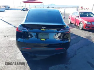 2023 Tesla Model Y Performance with VIN 7SAYGDEF6PF854797, listed as a IAAI auction lot 41319332 with 46,132 mi miles and . Bid and sale history available at DreamBid. Image 16.