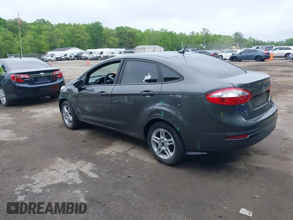 2019 Ford Fiesta SE z VIN 3FADP4BJ7KM155094, wystawiony jako IAAI lot #42186126 z przebiegiem 93 684 mil mil oraz . Historia ofert i sprzedaży dostępna na DreamBid. Obrazek 3.