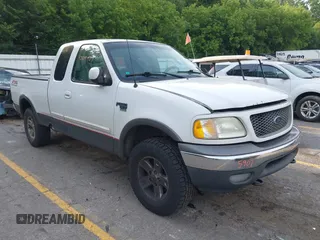 2003 Ford F-150 XL with VIN 2FTRX18L23CA29486, listed as a IAAI auction lot 42615907 with Not provided miles and . Bid and sale history available at DreamBid. Image 1.