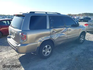 2007 Honda Pilot EX-L with VIN 5FNYF28537B024558, listed as a IAAI auction lot 41806196 with 196,256 mi miles. Bid and sale history available at carsss.com. Image 4.
