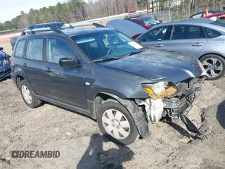 2004 Mitsubishi Outlander LS with VIN JA4LX31F344003223, listed as a IAAI auction lot 41614338 with 135,101 mi miles. Bid and sale history available at carsss.com. Image 1.