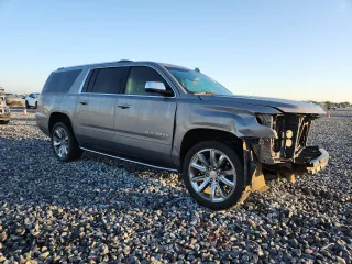 2019 Chevrolet Suburban LT with VIN 1GNSCJKC3KR129739, listed as a Copart auction lot 62377465 with 105,771 mi miles and Salvage title. Bid and sale history available at DreamBid. Image 4.