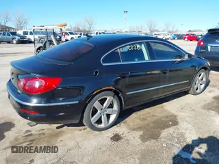2009 Volkswagen CC 4Motion with VIN WVWGU73C19E515087, listed as a IAAI auction lot 41862228 with 194,115 mi miles. Bid and sale history available at carsss.com. Image 4.