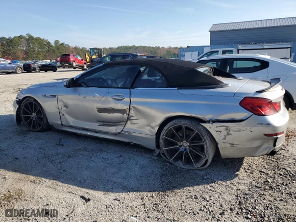 2012 BMW 6 Series 650i with VIN WBALZ3C54CDL72480, listed as a Copart auction lot 82797714 with 114,154 mi miles and Clean Title. Bid and sale history available at carsss.com. Image 2.